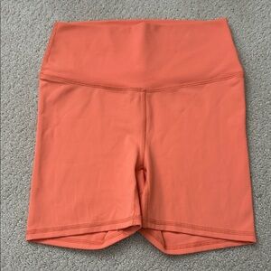 Five Dancewear orange shorts